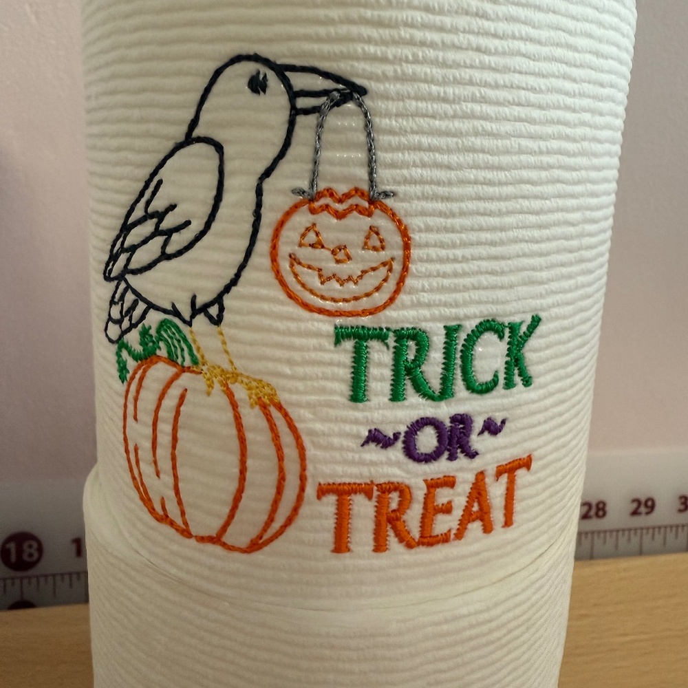 holiday embroidered toilet paper, trick or treat sign for Halloween